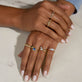 Model wearing Yellow Gold Jelly Beans Ring with solid gold Stone and Strand jewelry