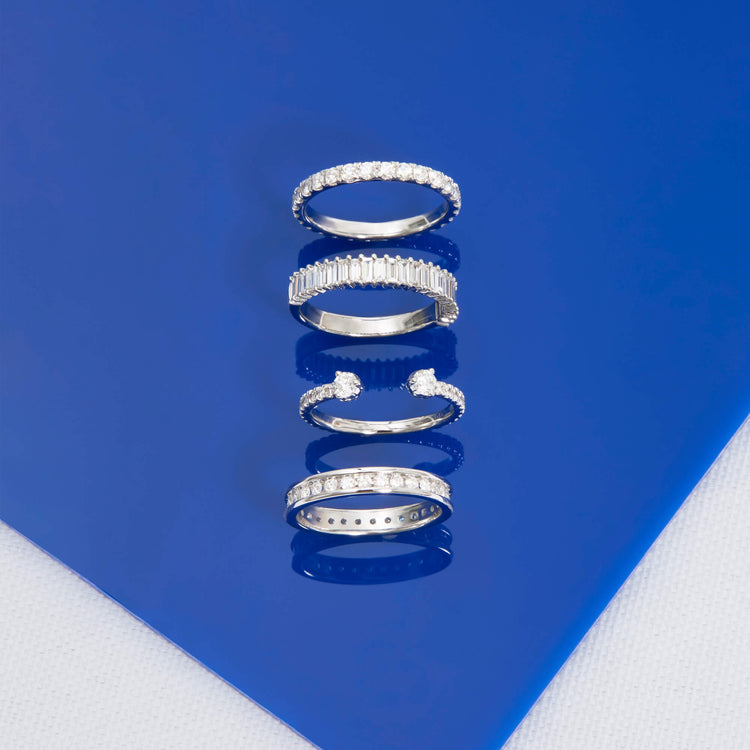 Still life image of Diamond Channel Ring with Stone and Strand solid gold jewelry