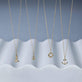 Still life image of Back To Shore Lighthouse Necklace with Stone and Strand solid gold jewelry