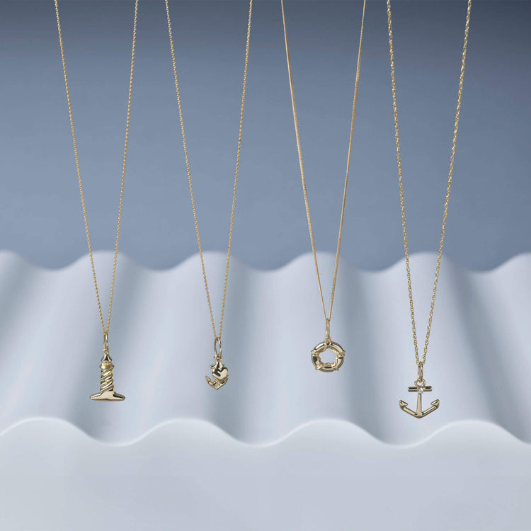 Still life image of Head Above The Water Necklace with Stone and Strand solid gold jewelry