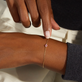 Image of 10K Yellow Gold Sapphire Luxe Dainty Pink Bracelet with Pink Sapphire on Models Arm