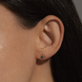 Image of 10K Yellow Gold Small Birthstone Bonbon Studs with Blue Sapphire on Models Ear