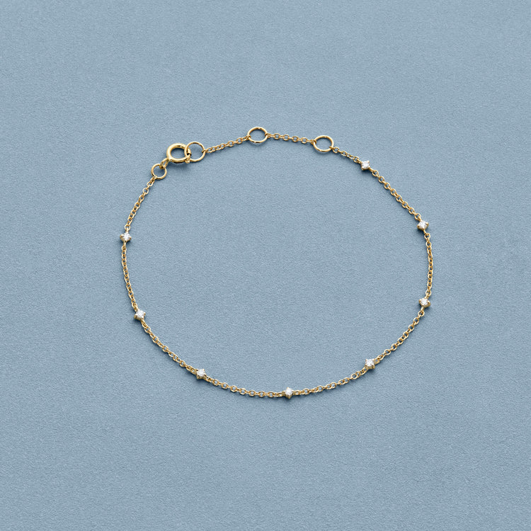 Stone and Strand 10K Yellow Gold Teeny Diamond Drizzle Bracelet Editorial Image