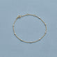 Stone and Strand 10K Yellow Gold Teeny Diamond Drizzle Bracelet Editorial Image