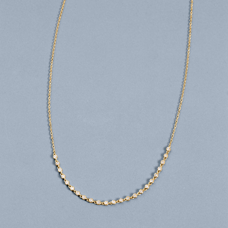 Stone and Strand 10K Yellow Gold Teeny Diamond Rally Tennis Necklace Editorial Image