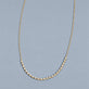 Stone and Strand 10K Yellow Gold Teeny Diamond Rally Tennis Necklace Editorial Image