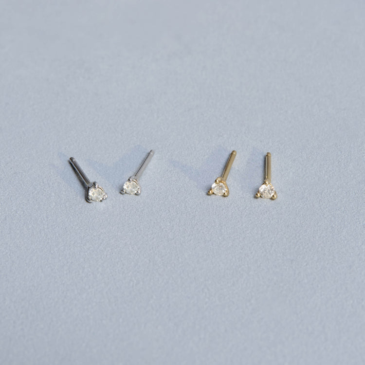 Stone and Strand 10K Yellow Gold and White Gold Teeny Diamond Stud Editorial Image