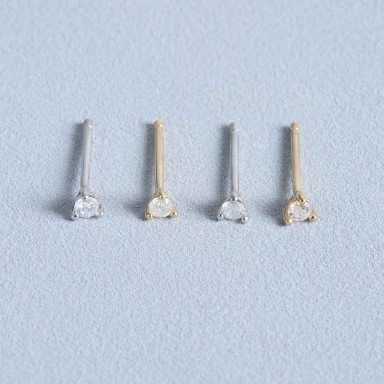Stone and Strand 10K Yellow Gold and White Gold Teeny Diamond Stud Editorial Image