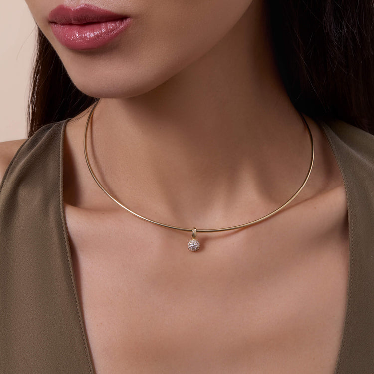 Image of 14K Yellow Gold Tenembaum Diamond Charm on Models Neck