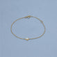 Stone and Strand 14K Yellow Gold The Donna Bracelet Editorial Image