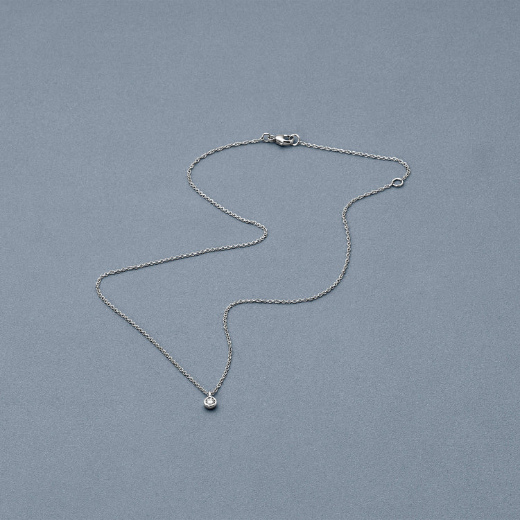 Stone and Strand 14K White Gold The Essential Dainty Diamond Solitaire Necklace Editorial Image