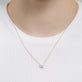 Image of 14K Yellow Gold The Essential Diamond Solitaire Necklace on Models Neck