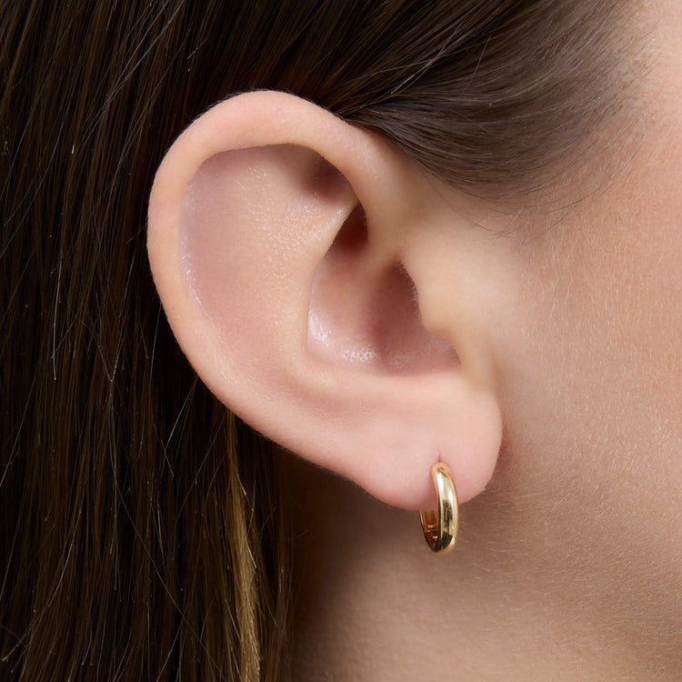 Image of 14K Yellow Gold The Essential Gold Hoop on Models Ear