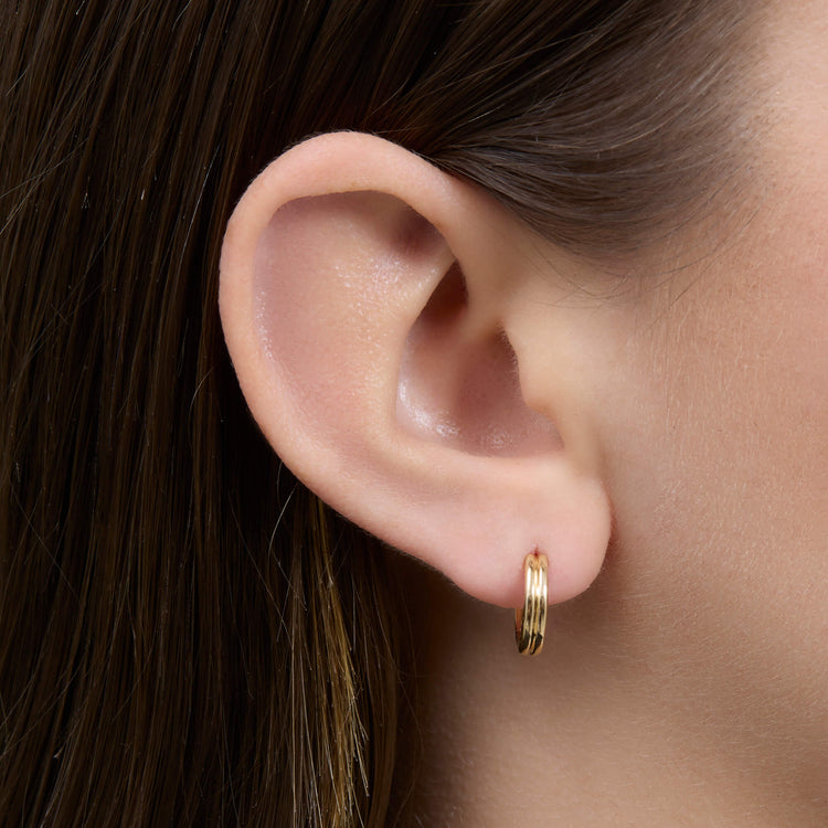 Image of 14K Yellow Gold The Essential Ridged Hoop on Models Ear