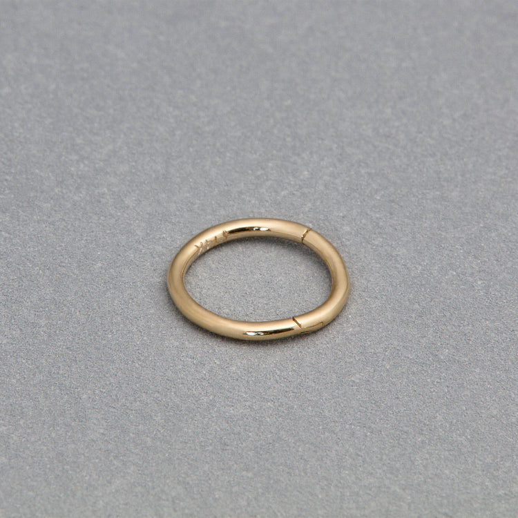 Stone and Strand 14K Yellow Gold Thin Clicker Editorial Image