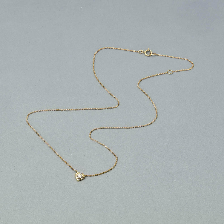 Stone and Strand 10K Yellow Gold Tie The Knot Diamond Necklace Editorial Image