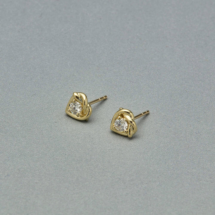 Stone and Strand 10K Yellow Gold Tie The Knot Diamond Studs Editorial Image