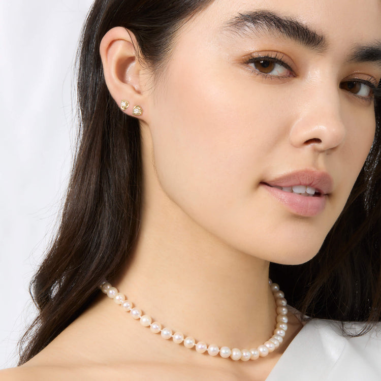 Model wearing Tie The Knot Diamond Studs with solid gold Stone and Strand jewelry