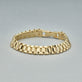 Stone and Strand 14K Yellow Gold Timepiece Bracelet Editorial Image
