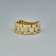 Stone and Strand 14K Yellow Gold Timepiece Ring Editorial Image