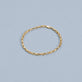 Stone and Strand 14K Yellow Gold Tiny Chunky Chain Bracelet Editorial Image
