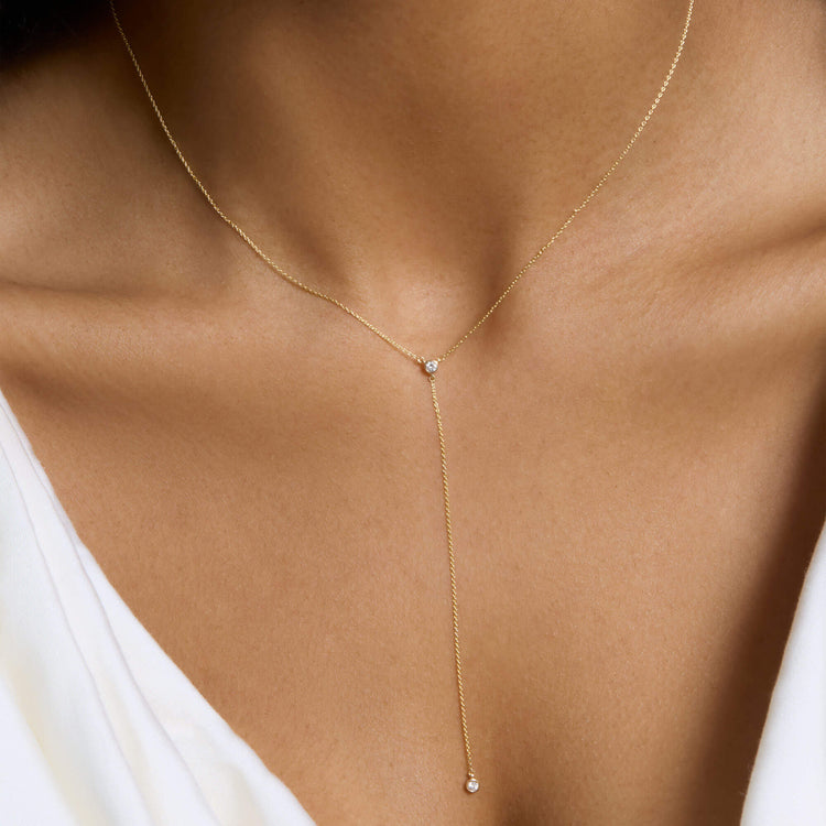 Image of 14K Yellow Gold Tiny Diamond Lariat Necklace on Models Neck