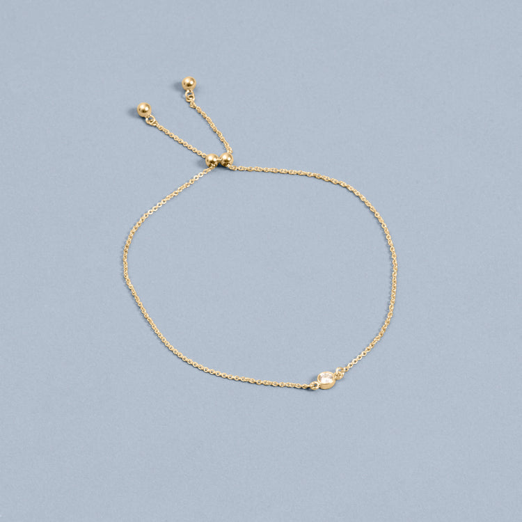 Stone and Strand 14K Yellow Gold Tiny Diamond Slider Bracelet Editorial Image