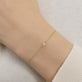 Image of 14K Yellow Gold Tiny Diamond Slider Bracelet on Models Arm