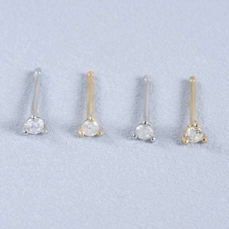 Stone and Strand 14K Yellow Gold and White Gold Tiny Diamond Stud Editorial Image