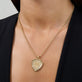 Image of 14K Yellow Gold Titleholder Edition Pave Charm on Models Neck