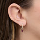 Image of 14K Yellow Gold Tourmaline Diamond Huggies on Models Ear