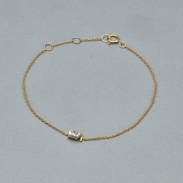 Stone and Strand 10K Yellow Gold Twinkling Twine Pave Chained Bracelet Editorial Image