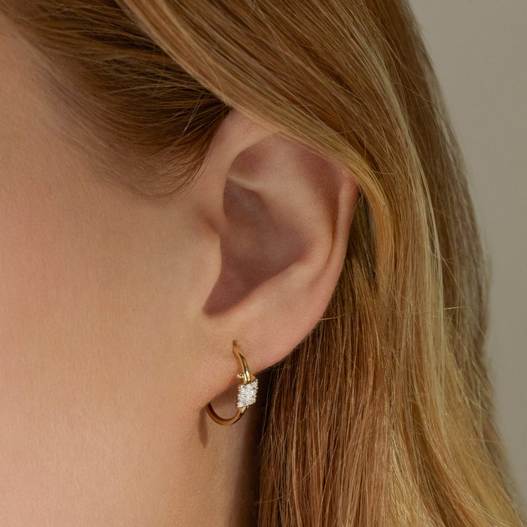 Image of 10K Yellow Gold Twinkling Twine Pav√© Hoops on Models Ear