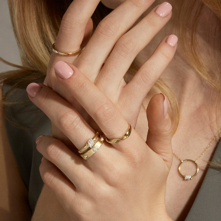 Image of 14K Yellow Gold Twist And Turn Ring with Stone and Strand Rings