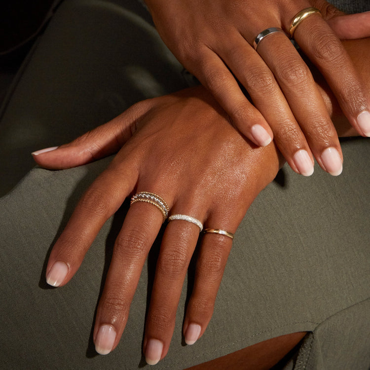 TWIST-OF-SILVER-STACKING-RING-ONBODY-STYLED