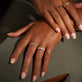 TWIST-OF-SILVER-STACKING-RING-ONBODY-STYLED