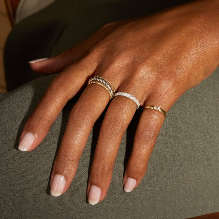 TWIST-OF-SILVER-STACKING-RING-ONBODY