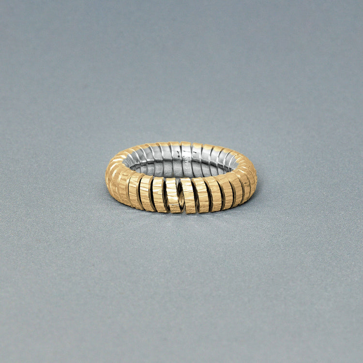 Stone and Strand 14K Yellow Gold Switch Gold Tubogas Ring Editorial Image