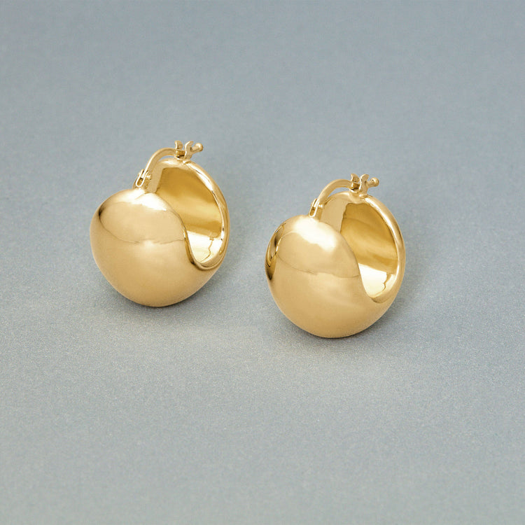 Stone and Strand 14K Yellow Gold Ultra Puff Gold Huggies Editorial Image