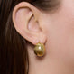 Image of 14K Yellow Gold Ultra Puff Gold Huggies on Models Ear