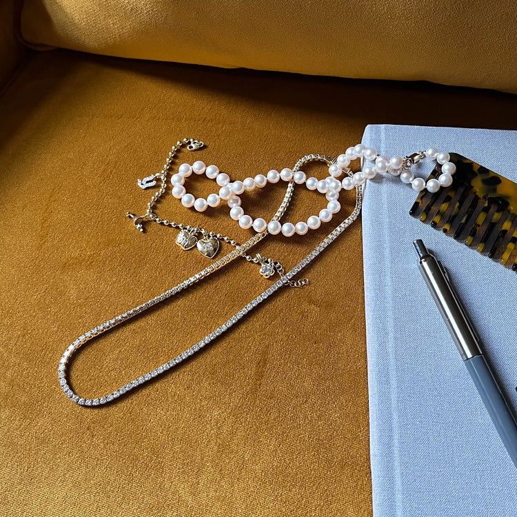 Still life image of Unflippable Tennis Necklace in White Gold with Stone and Strand solid gold jewelry