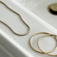 Still life image of Unflippable Tennis Necklace in Yellow Gold with Stone and Strand solid gold jewelry