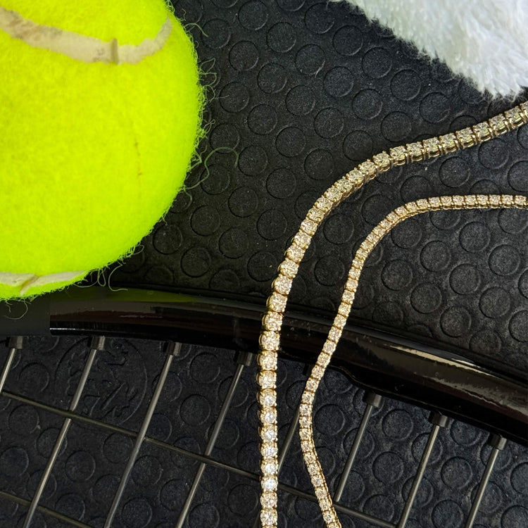 Still life image of Unflippable Tennis Necklace in Yellow Gold with Stone and Strand solid gold jewelry