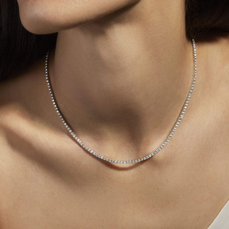 Image of 14K White Gold Unflippable Tennis Necklace In White Gold on Models Neck