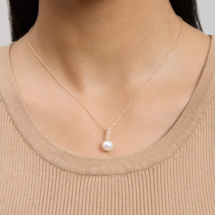 Image of 14K Yellow Gold Uptown Pearl Diamond Necklace on Models Neck