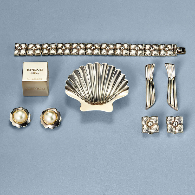 Still life image of Vintage Silver Pearl Flower Clip On Earrings with Stone and Strand Vintage Collection