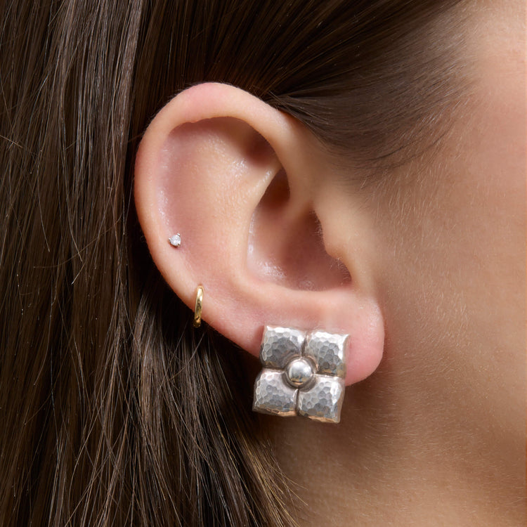 Image of Vintage Silver Flower Clip On Earrings on Models Ear