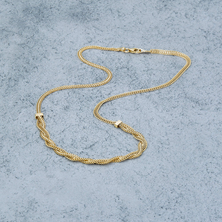 Stone and Strand 10K Yellow Gold Woven In Gold Braided Necklace Editorial Image