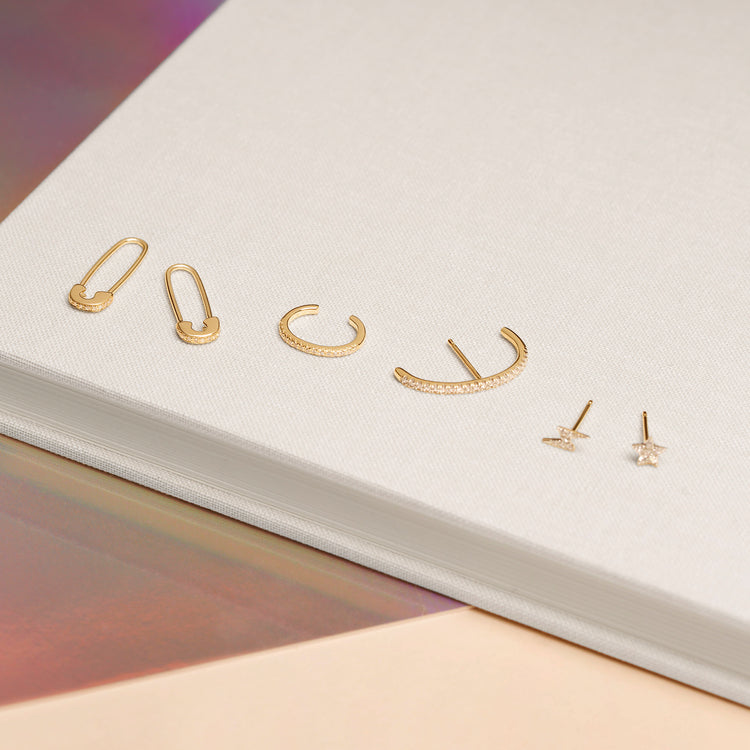 Still life image of 15 Diamond Pave Ear Cuff with Stone and Strand solid gold jewelry