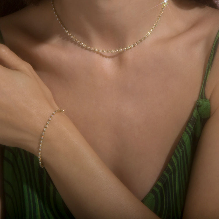 Image of 14K Yellow Gold Ace Diamond Tennis Bracelet on Models Arm